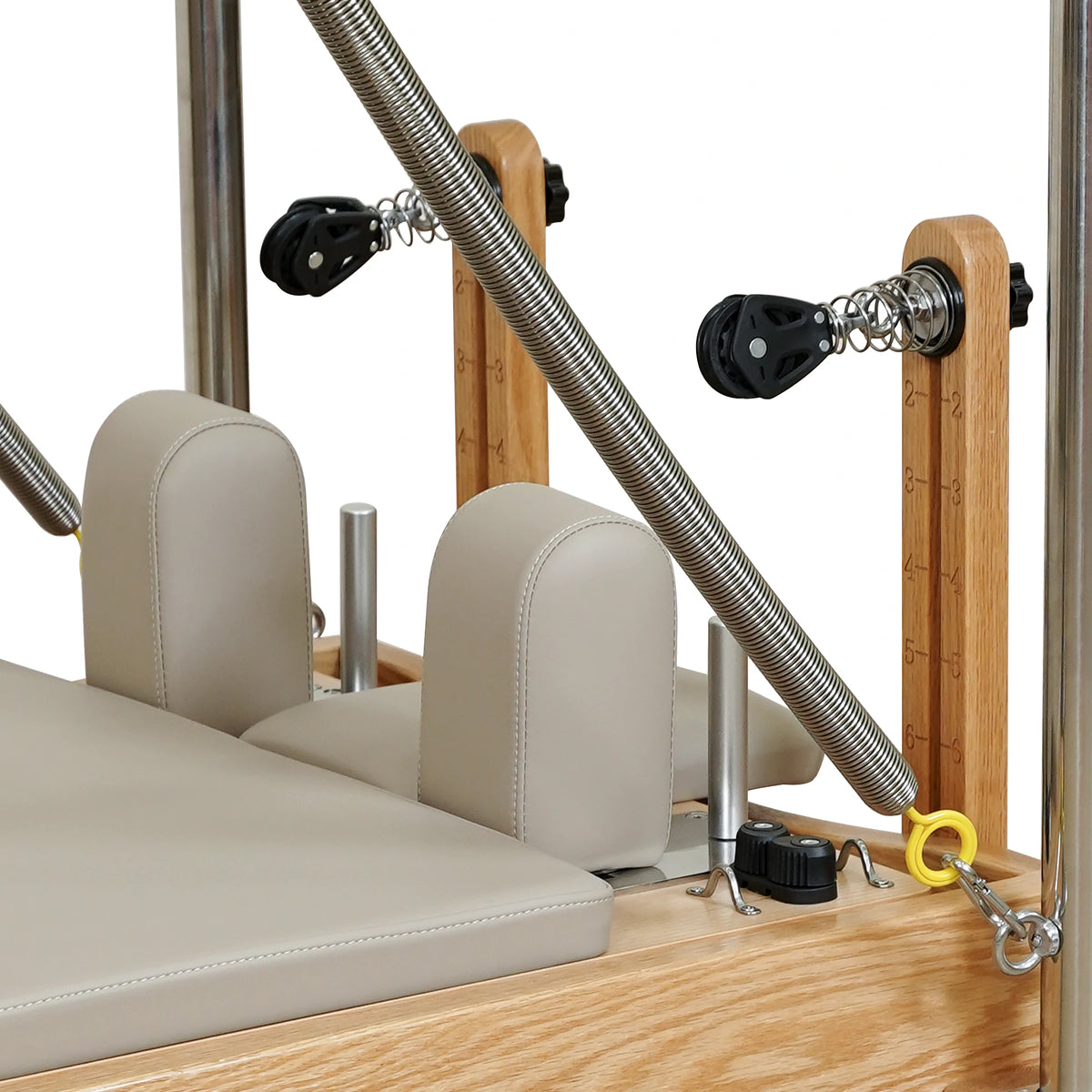 Latte carriage headrest, shoulder rests and pulley detail on a Gymfrog Cadillac Reformer Combo