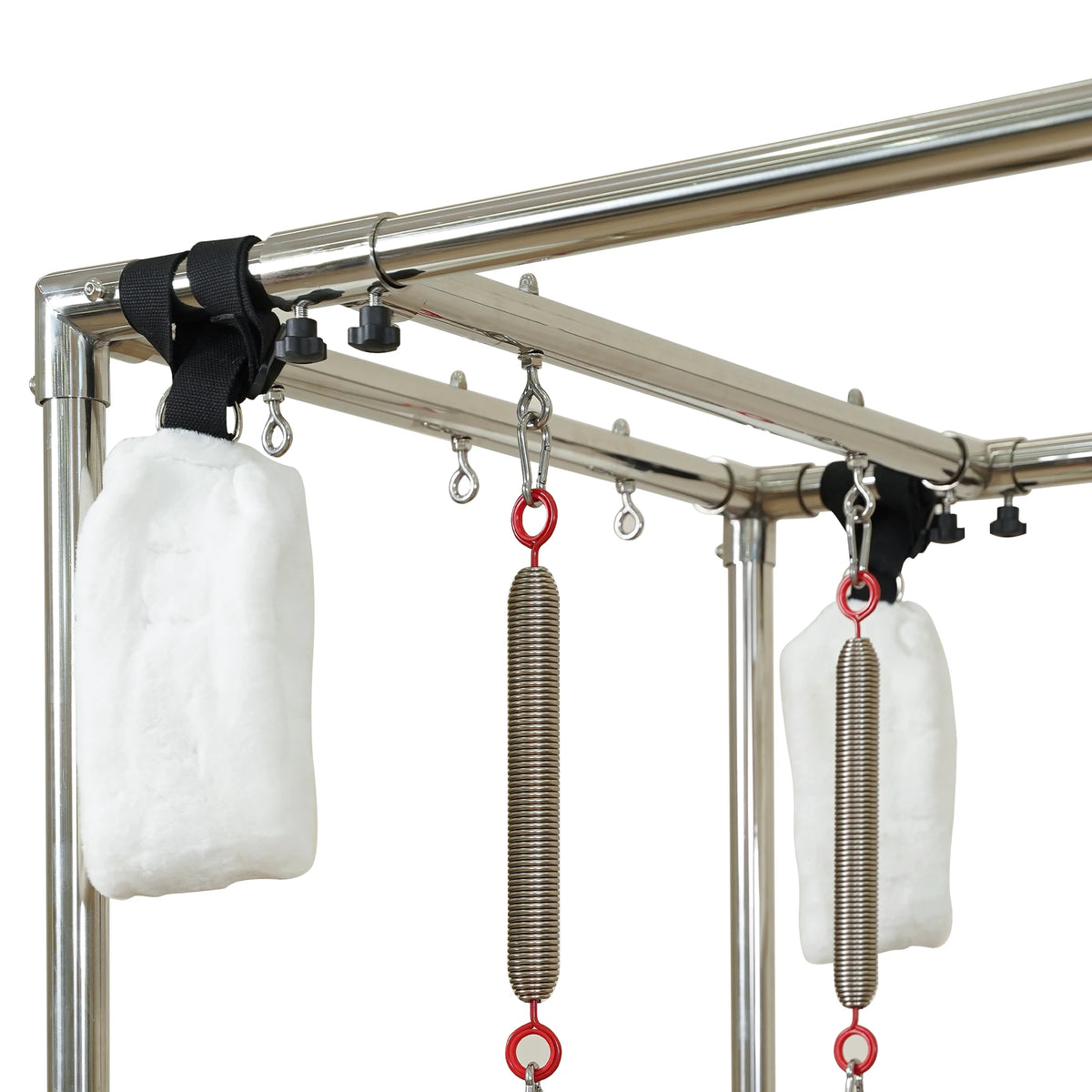 Overhead frame, springs and padded hanging loops on a Gymfrog Cadillac Reformer Combo