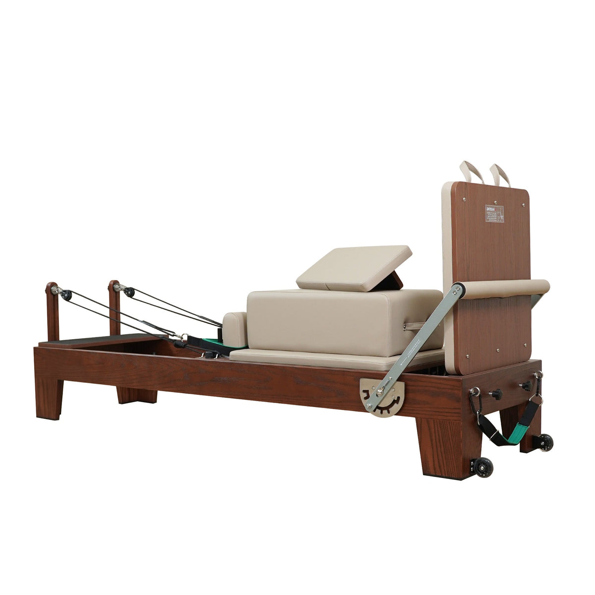 Gymfrog Pilates reformer with latte upholstery, three-quarter view from the footbar end