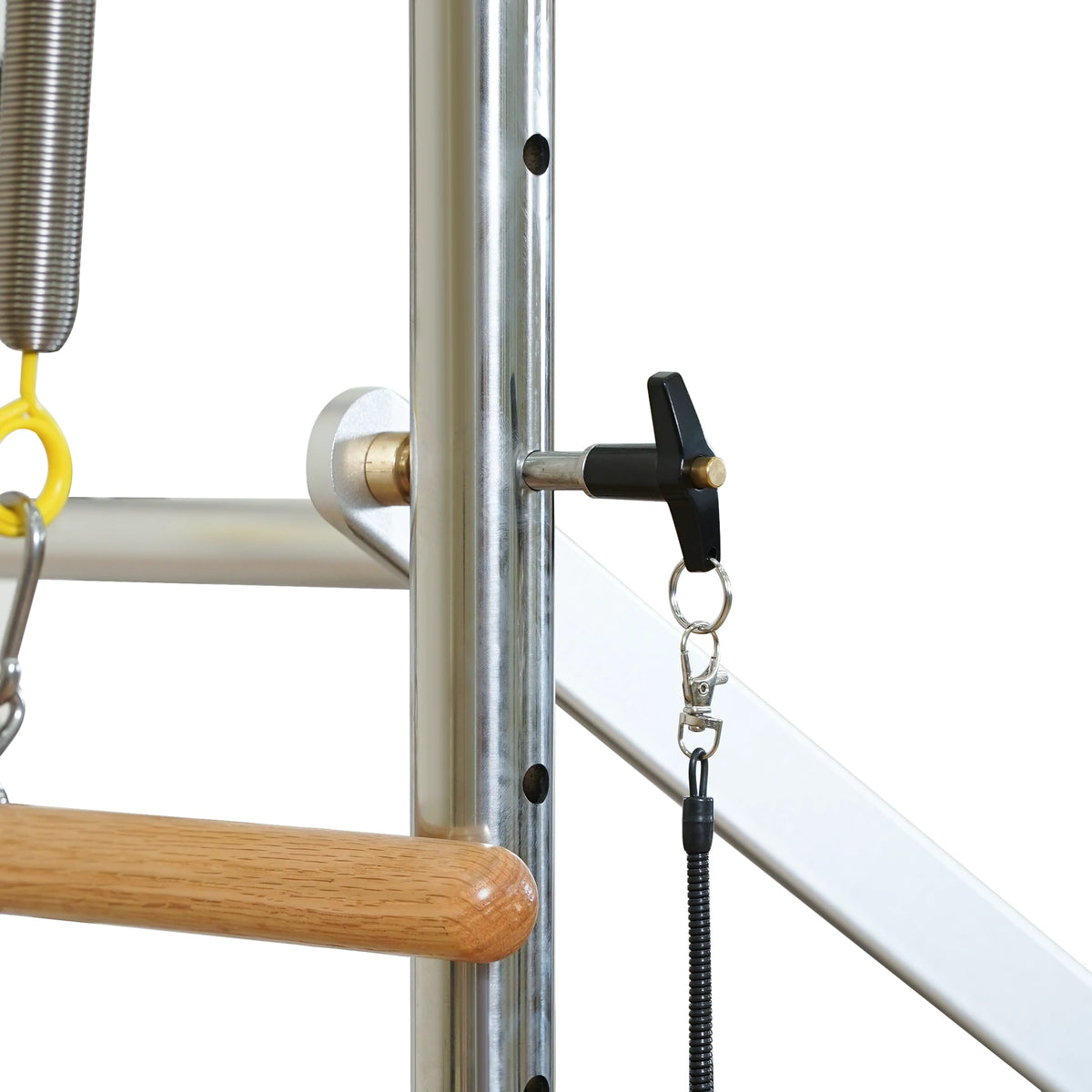Wooden bar clamp and locking knob on a Gymfrog Pilates Cadillac