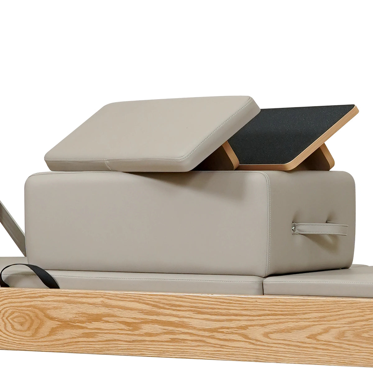 Stacked upholstered box and loose padded panels in latte on a Gymfrog Cadillac Reformer Combo